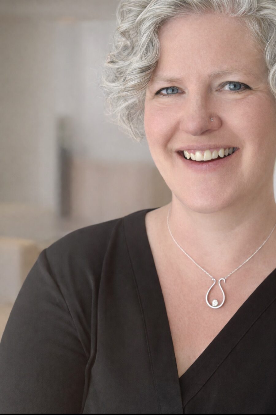 Portrait of Marie Clarke, founder of Crone & Current Collaborative